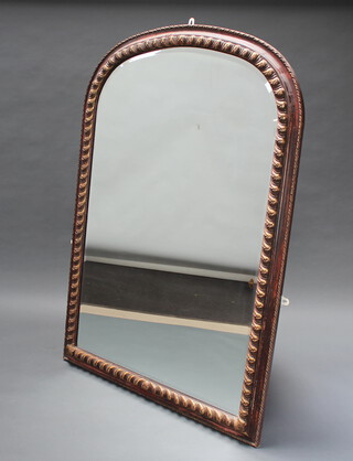 A Victorian style bevelled plate over mantel mirror contained in a decorative gilded frame 152cm x 107cm 
