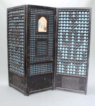 An Anglo Indian pierced and ebonised 3 fold dressing screen, the centre section with watercolour drawing of a street vendor and lady 170cm h x 69cm when closed x 205cm when open 