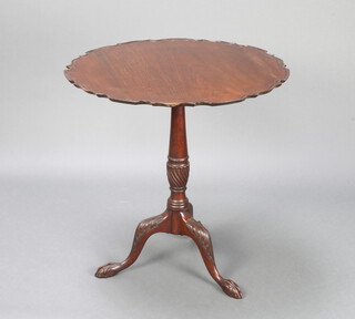 An Edwardian Chippendale style circular mahogany snap top tea table with bracketed border, raised on a turned column and tripod base with egg and claw feet 70cm h x 69cm diam. 