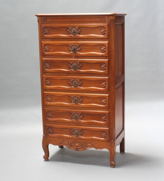 A French carved "walnut" pedestal chest of 7 drawers, raised on cabriole supports 136cm h x 74cm w x 45cm d 