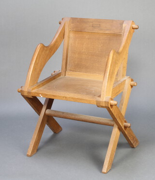 An oak Glastonbury chair 