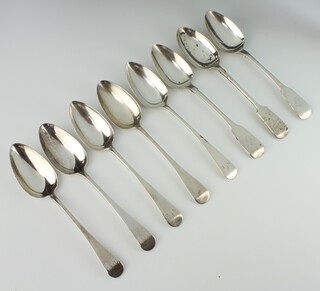 A George III silver table spoon London 1810, 7 others mixed dates, 550 grams
