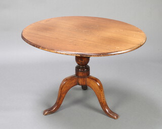 A 19th Century oval bleached mahogany snap top tea table raised on pillar and tripod base 61cm h x 92cm w x 76cm d 