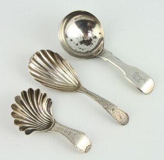 A George III silver caddy spoon by Hester Bateman London 1785 and 2 other caddy spoons 38 grams 