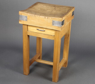 A square metal bound butcher's block raised on a beech stand with square supports and H framed stretcher 85cm h x 50cm w x 50cm d 
