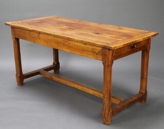 A 19th Century French fruitwood dining table fitted 2 long drawers, raised on square chamfered supports with H framed stretcher 75cm h x 151cm l x 72cm w 