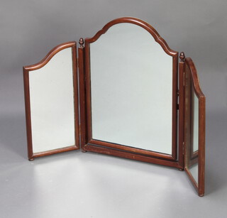 A 1930's arch shaped triple plate dressing table mirror contained in a mahogany swing frame 63cm h x 94cm w x 