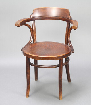 A Thonet bentwood carver chair, the base brande Thonet and with label 