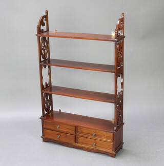 A Chippendale style mahogany 4 tier wall shelf with pierced panels to the side, the base fitted 4 long drawers 113cm h x 70cm w x 17cm d 