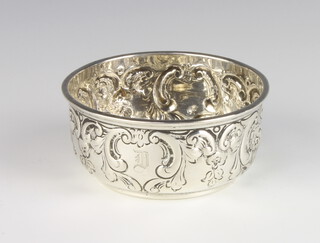 An Edwardian repousse silver bowl decorated with scrolls and monogram Birmingham 1902, 8.5cm, 76 grams