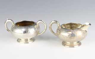 A Sterling silver sugar bowl and cream jug 310 grams 