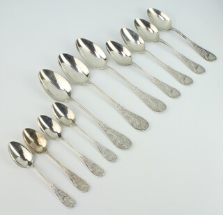 A set of Tiffany and Co Sterling silver spoons decorated with birds comprising 4 tea, 4 dessert and 3 tablespoons, 530 grams 