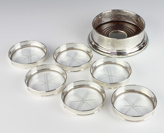 A set of 6 Sterling silver mounted glass based coasters and a Tiffany and Co. silver coaster 13cm 