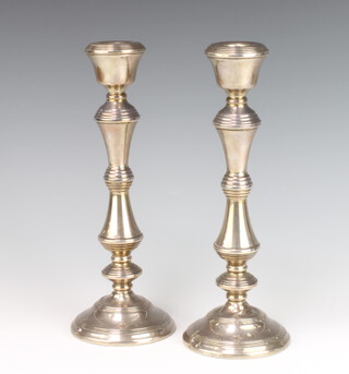 A pair of silver Queen Anne style turned candlesticks, Birmingham 1982, 28 cm