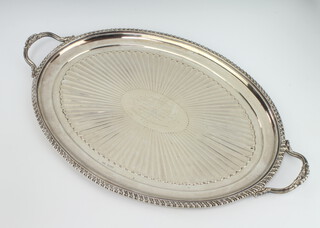 A Victorian oval silver 2 handled tray with beaded rim, demi-fluted decoration and presentation inscription, Sheffield 1898, Roberts & Belk 49cm 1330 grams 