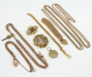 A Victorian gilt in memoriam locket and minor gilt jewellery 
