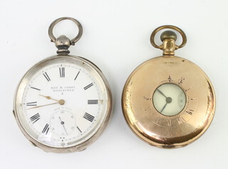 A gilt cased half hunter pocket watch the dial inscribed Waltham, a silver cased pocket watch 