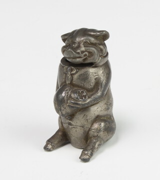 An Edwardian plated vesta in the form of a seated pig 