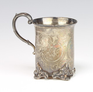 A Victorian silver mug with engraved inscription and flowers on scroll feet, London 1851, 100 grams 