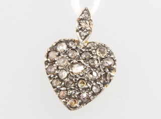 A yellow gold diamond set heart shaped pendant, approx. 1ct, 18mm 