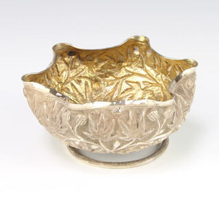 An Indian silver floral shaped bowl with leaf decoration raised on a spiral stem 190 grams 