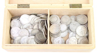 A quantity of pre-1947 coinage, 590 grams 
