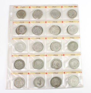 A quantity of half crowns including Edward VII, George V and George VI 