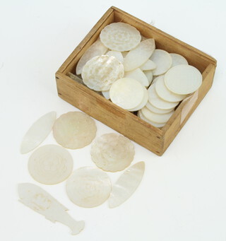 A quantity of 19th Century Chinese engraved mother of pearl counters 