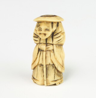 A 19th Century ivory netsuke in the form of a Dutchman holding a walking cane 5cm 