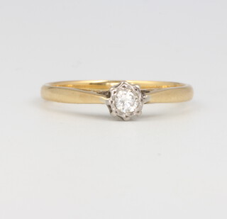 An 18ct yellow gold illusion set diamond ring 0.10ct, size M, 2.7 grams