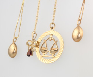 Four 9ct yellow gold pendants and chains, a pair of earrings and a pendant, 14 grams