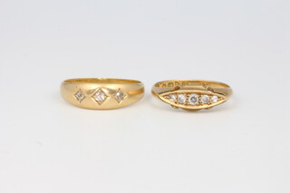 Two 18ct yellow gold diamond set rings size N and O 1/2, 6 grams