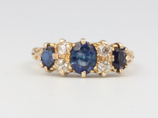 An 18ct yellow gold sapphire and diamond ring, size M, 3.2 grams