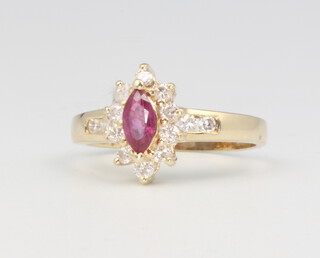 A 14ct yellow gold ruby and diamond cluster ring size L, 2.4 grams 