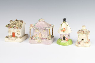 A Staffordshire pastel burner of a thatched cottage 9cm, ditto pink house 10cm, another 10cm and a smaller ditto 8cm 