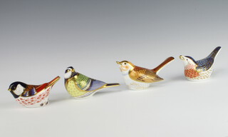 A Royal Crown Derby Imari pattern paperweight Coal Tit with gold stopper 9cm, ditto Green Tit gold stopper 12cm, ditto bird gold stopper 12cm and another gold stopper 13cm  