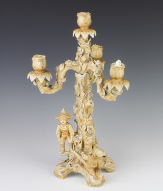 A German porcelain candelabrum with 4 lights, the base in the form of a rustic tree with children playing 40cm 