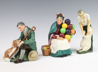 Two Royal Doulton figures - The Master HN2325 15cm and The Old Balloon Seller HN1315 15cm and a ceramic figure of a sheep shearer by J Firth 18cm 
