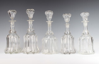 A pair of Edwardian decanters and stoppers 35cm, ditto 30cm and a single decanter 32cm  (5)