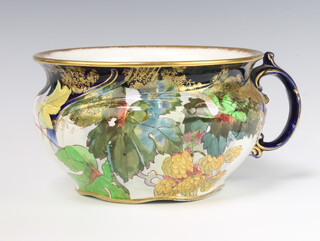 A Doulton Burslem chamber pot decorated with flowers 