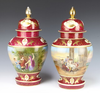 A pair of 20th Century Austrian vases decorated in the style of Kaufman with figures in landscapes 45cm 