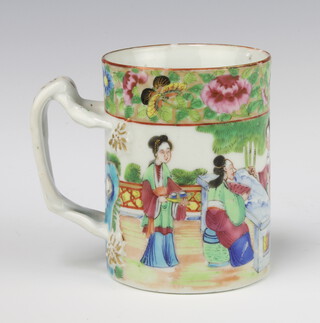 A Cantonese mug decorated with figures on a pavillion terrace with a rustic handle 9cm 