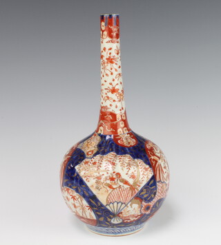 A 19th Century Imari bottle vase with panels of flowers 30cm 