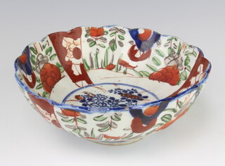 An Imari deep bowl decorated with flowers 21cm 