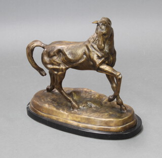 A 20th Century bronze figure of a walking horse raised on an oval marble base 46cm h x 53cm w x 28cm d 