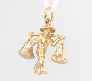A 9ct yellow gold Chinese trader charm 2 grams