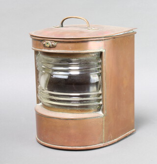 A copper ships masthead lantern, the bow front glass inscribed 24394 26cm h x 23cm w x 22cm d, converted to electricity 