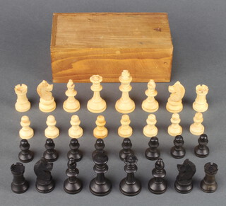 A Staunton chess set approx. 5cm h x 2.5cm diam. contained in a pine box 