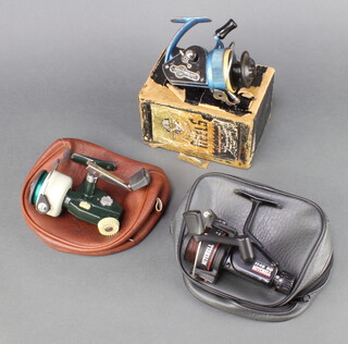 An Abu Cardinal 44 fishing reel, a Mitchell 1140 RD fishing reel and a JW Youngs Ambidex fixed spool reel boxed and with instructions 