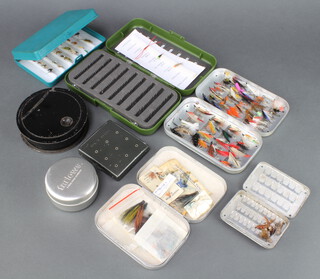 A circular Japanned double sided cast box, 3 Wheatley fly boxes, a Farlow cylindrical fly box and 3 other boxes  